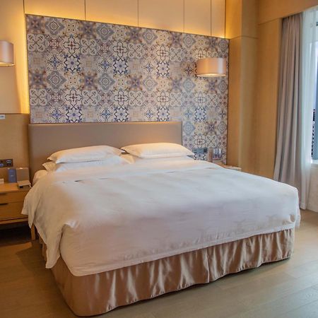 Hotel Wyndham Grand Plaza Royale Yuzhou Xiamen Wuyuan Bay Extérieur photo