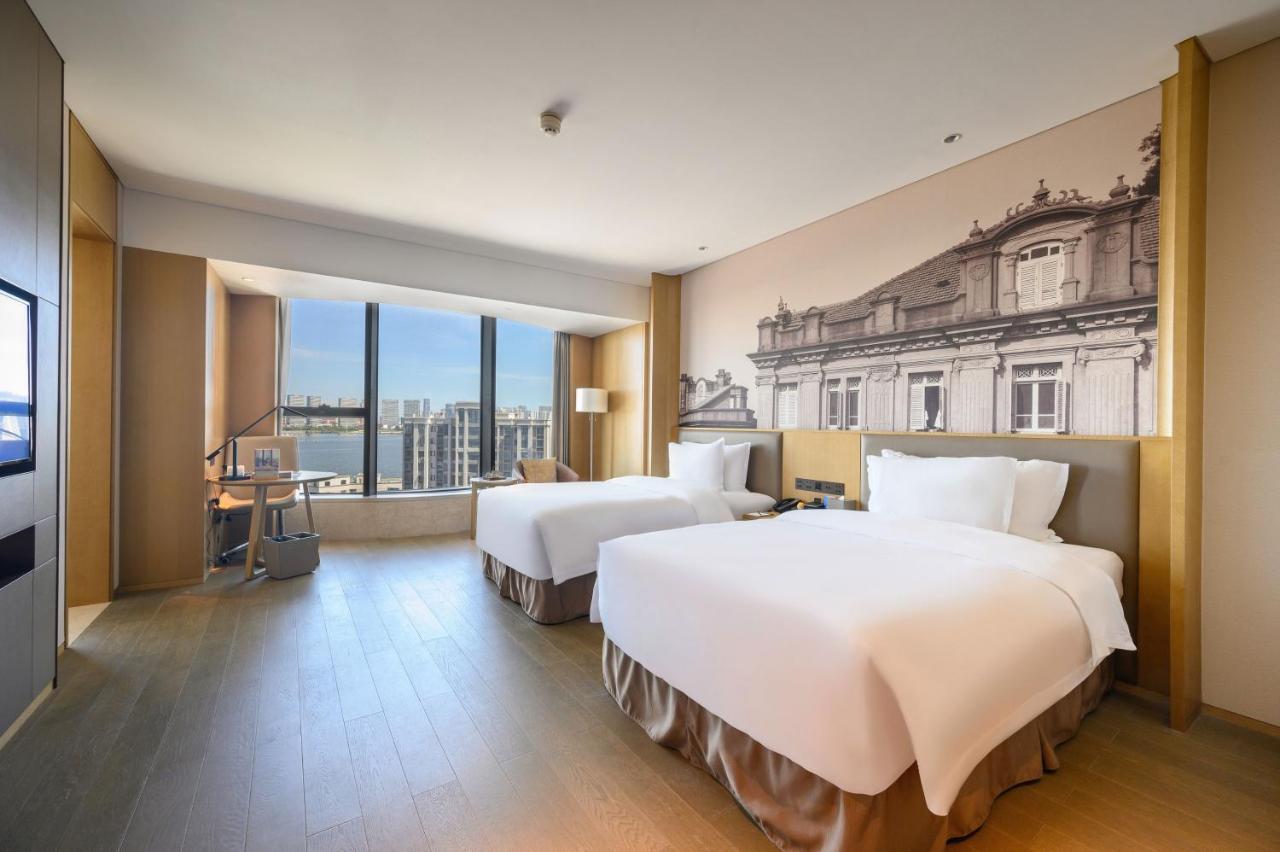 Hotel Wyndham Grand Plaza Royale Yuzhou Xiamen Wuyuan Bay Extérieur photo