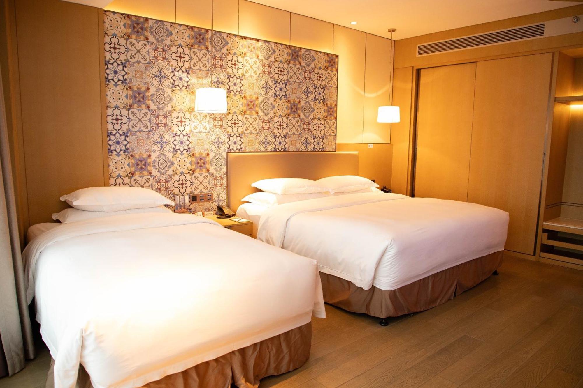 Hotel Wyndham Grand Plaza Royale Yuzhou Xiamen Wuyuan Bay Extérieur photo